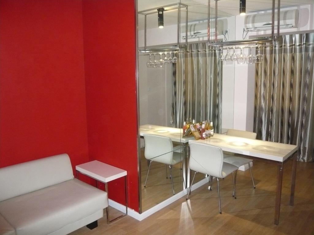 Qingdao Renjia Bussiness Hotel Quarto foto