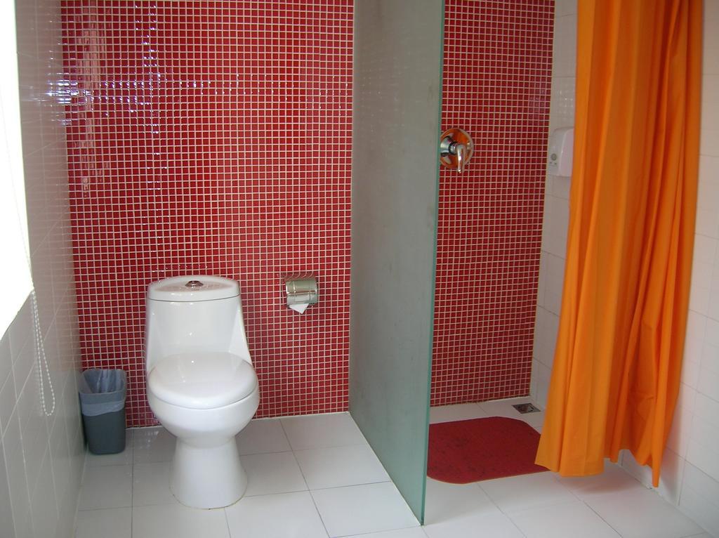 Qingdao Renjia Bussiness Hotel Quarto foto