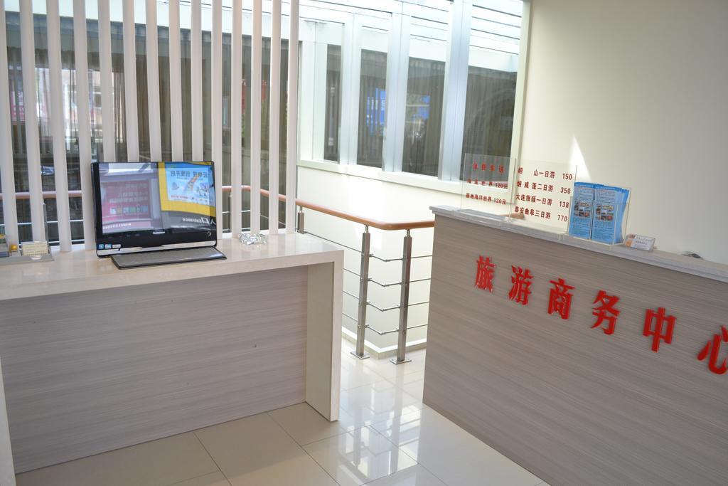 Qingdao Renjia Bussiness Hotel Quarto foto
