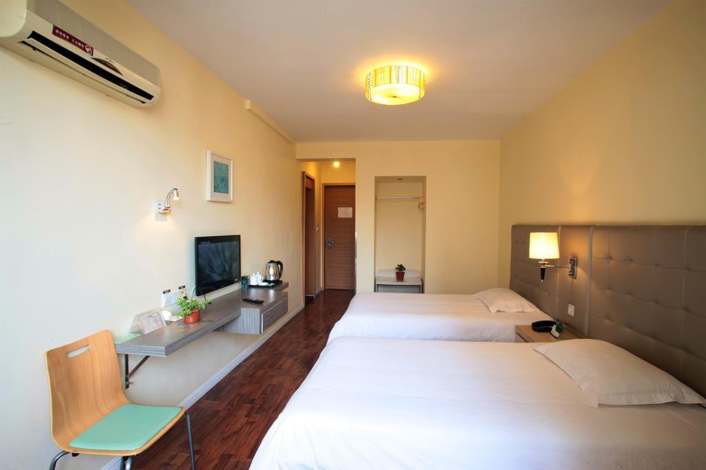 Qingdao Renjia Bussiness Hotel Exterior foto